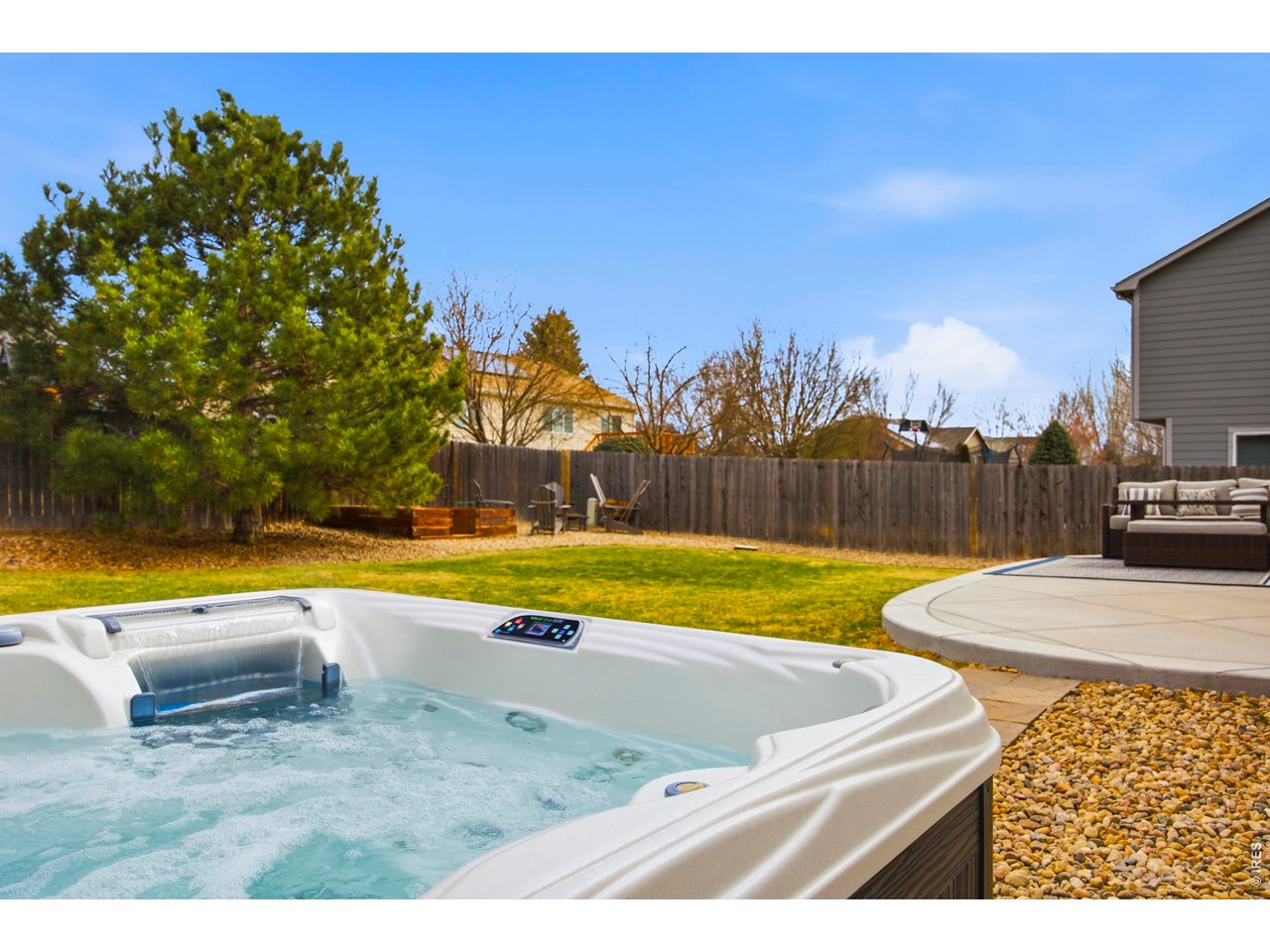 414 Prairie Clover Way Severance, CO 80550 - Photo 37 of 49 a view of a swimming pool and a yard