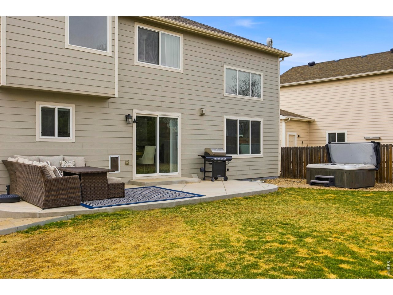 414 Prairie Clover Way Severance, CO 80550 - Photo 39 of 49 a swimming pool with outdoor seating