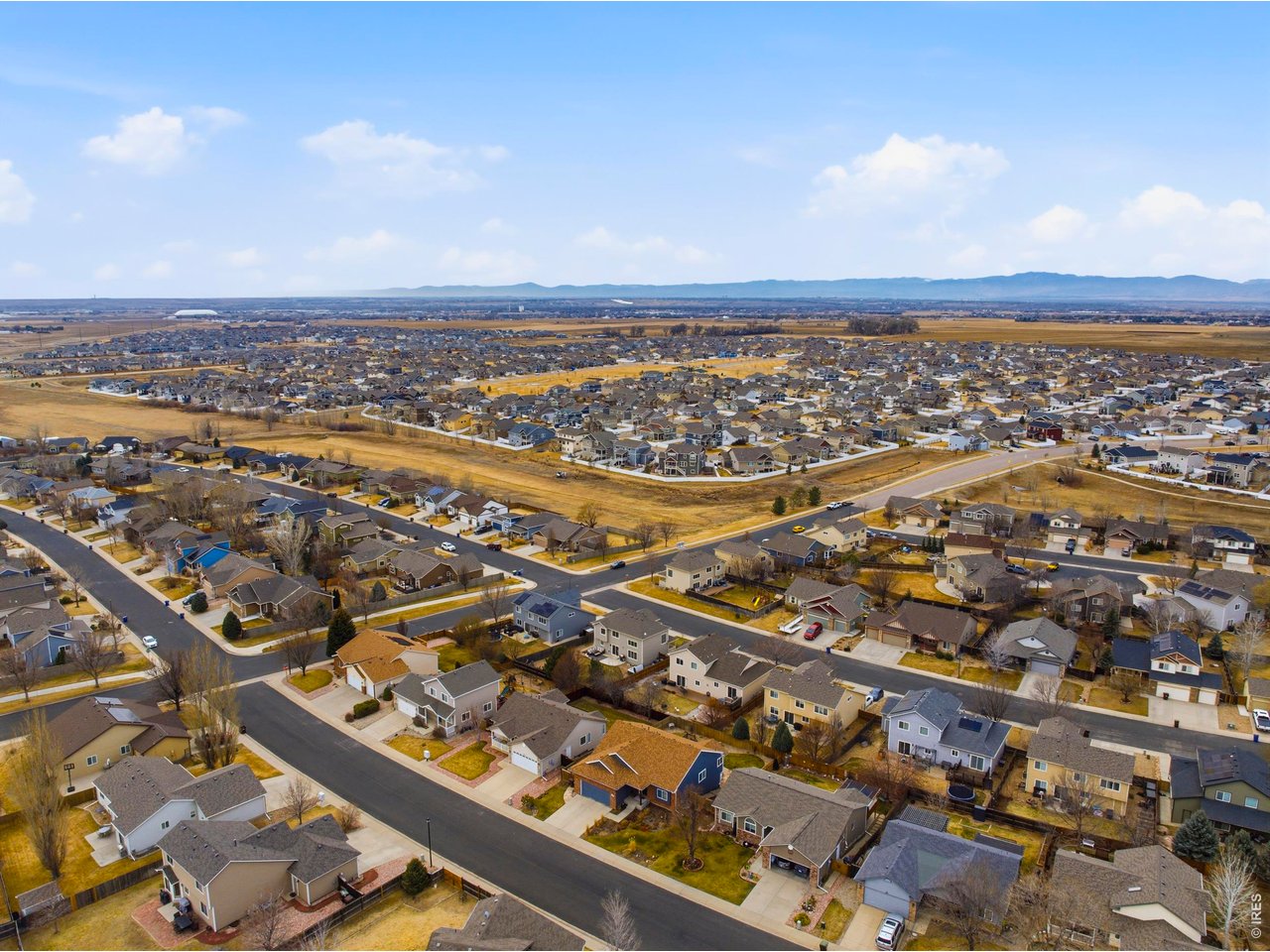 414 Prairie Clover Way Severance, CO 80550 - Photo 45 of 49 an aerial view of city and lake