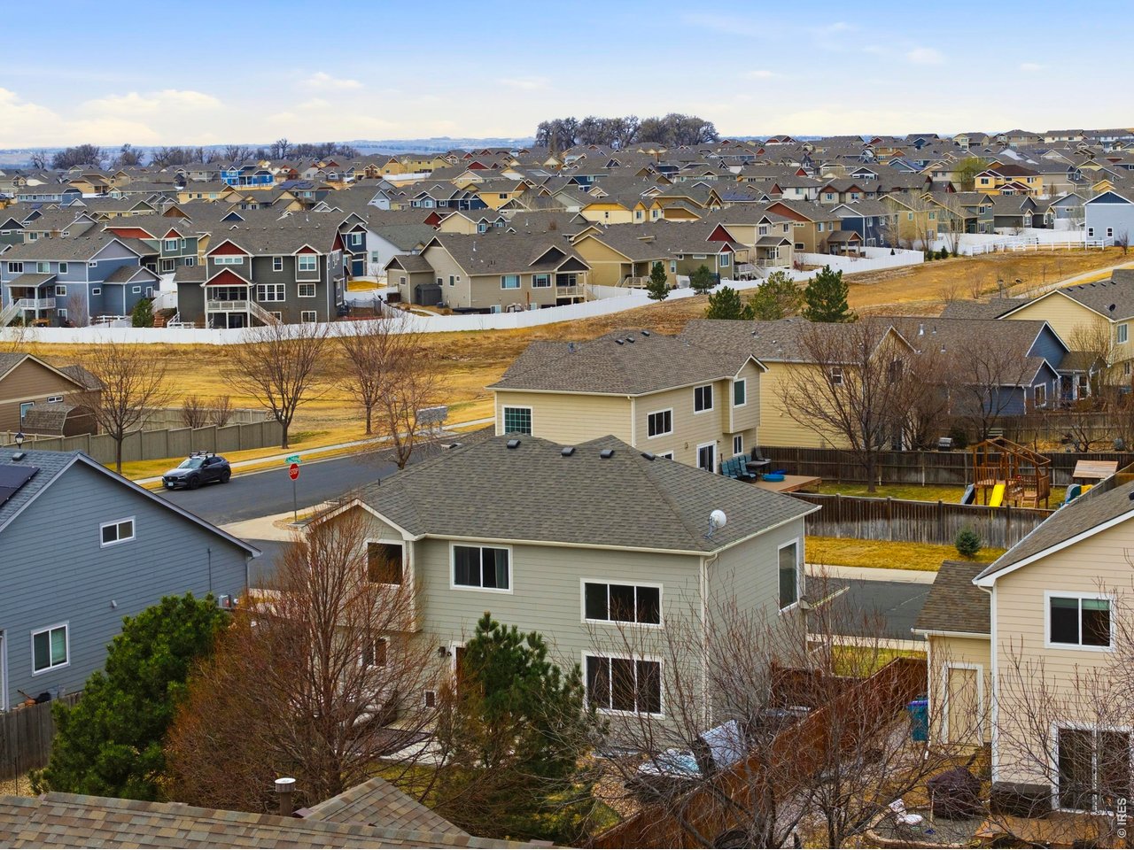 414 Prairie Clover Way Severance, CO 80550 - Photo 46 of 49 an aerial view of residential houses with outdoor space and parking