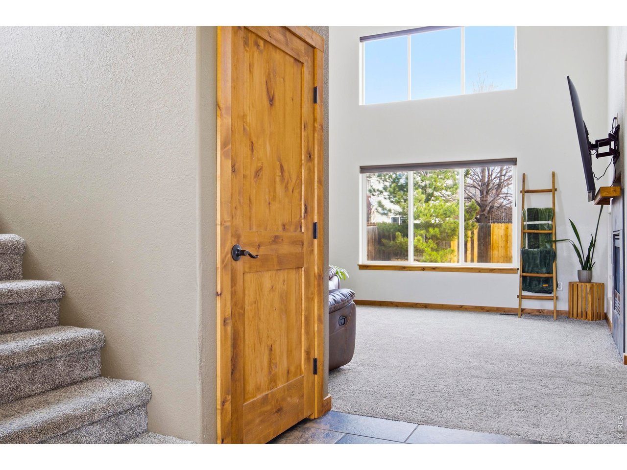 414 Prairie Clover Way Severance, CO 80550 - Photo 6 of 49 a living room with furniture and a window