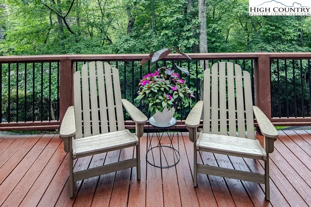 a view of a two chairs in the deck