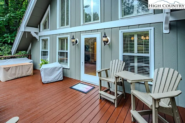a view of a house with sitting area and furniture