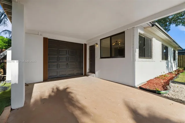 a view of road and yard with green space