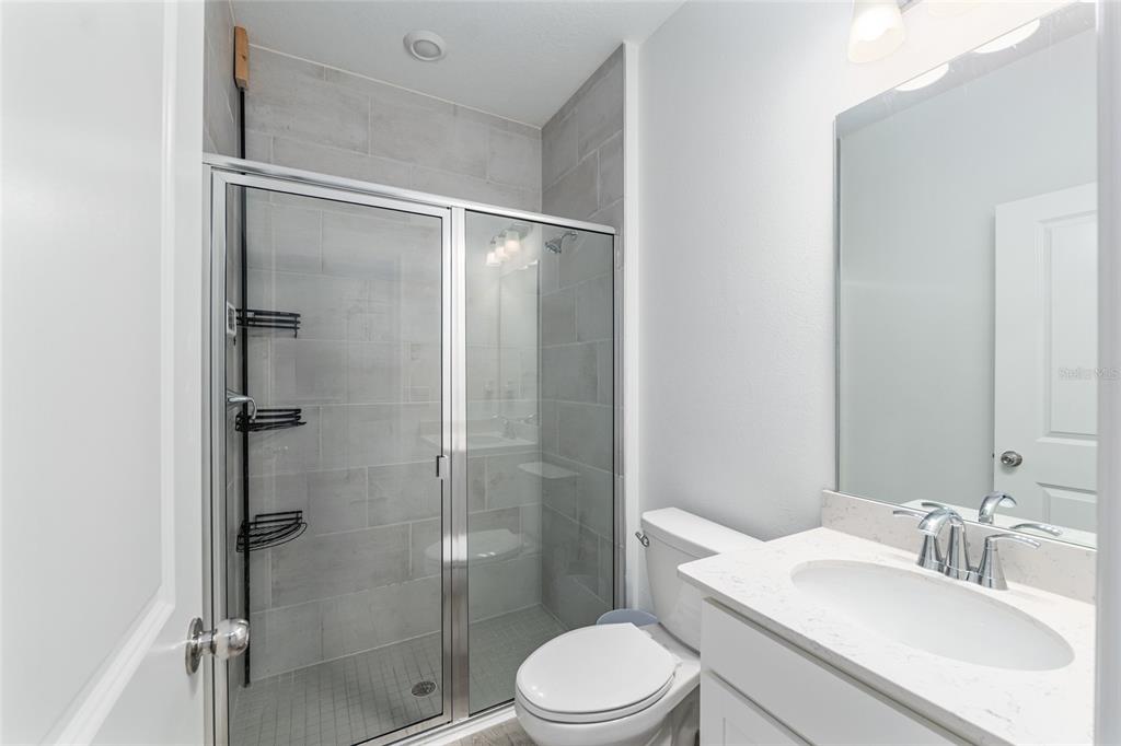 19692 Southwest 77th Loop Dunnellon, FL 34432 - Photo 8 of 20 a bathroom with a sink toilet and shower