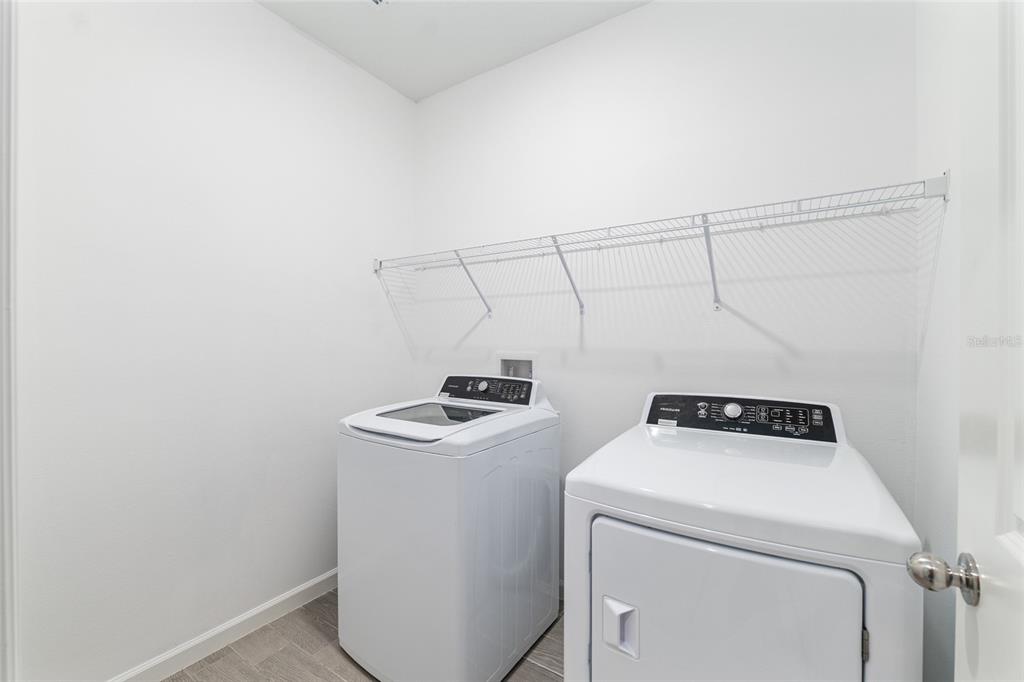 19692 Southwest 77th Loop Dunnellon, FL 34432 - Photo 9 of 20 a utility room with dryer and washer