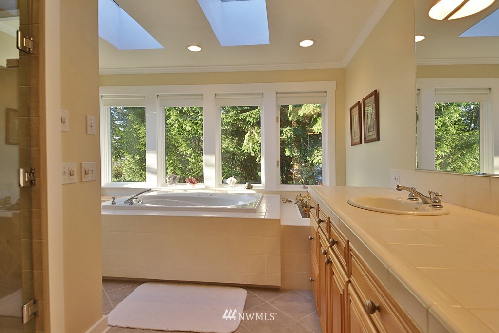 7120 Maxwelton Road Clinton, WA 98236 - Photo 18 of 25 a view of a kitchen with a sink and large window