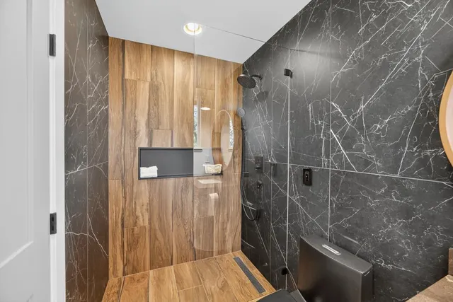 a view of entryway and wooden floor