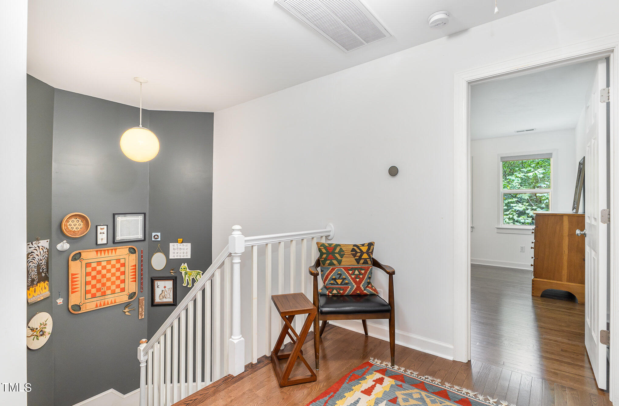 1713 Evergreen Avenue Raleigh, NC 27603 - Photo 14 of 26 a view of a livingroom with furniture and wooden floor
