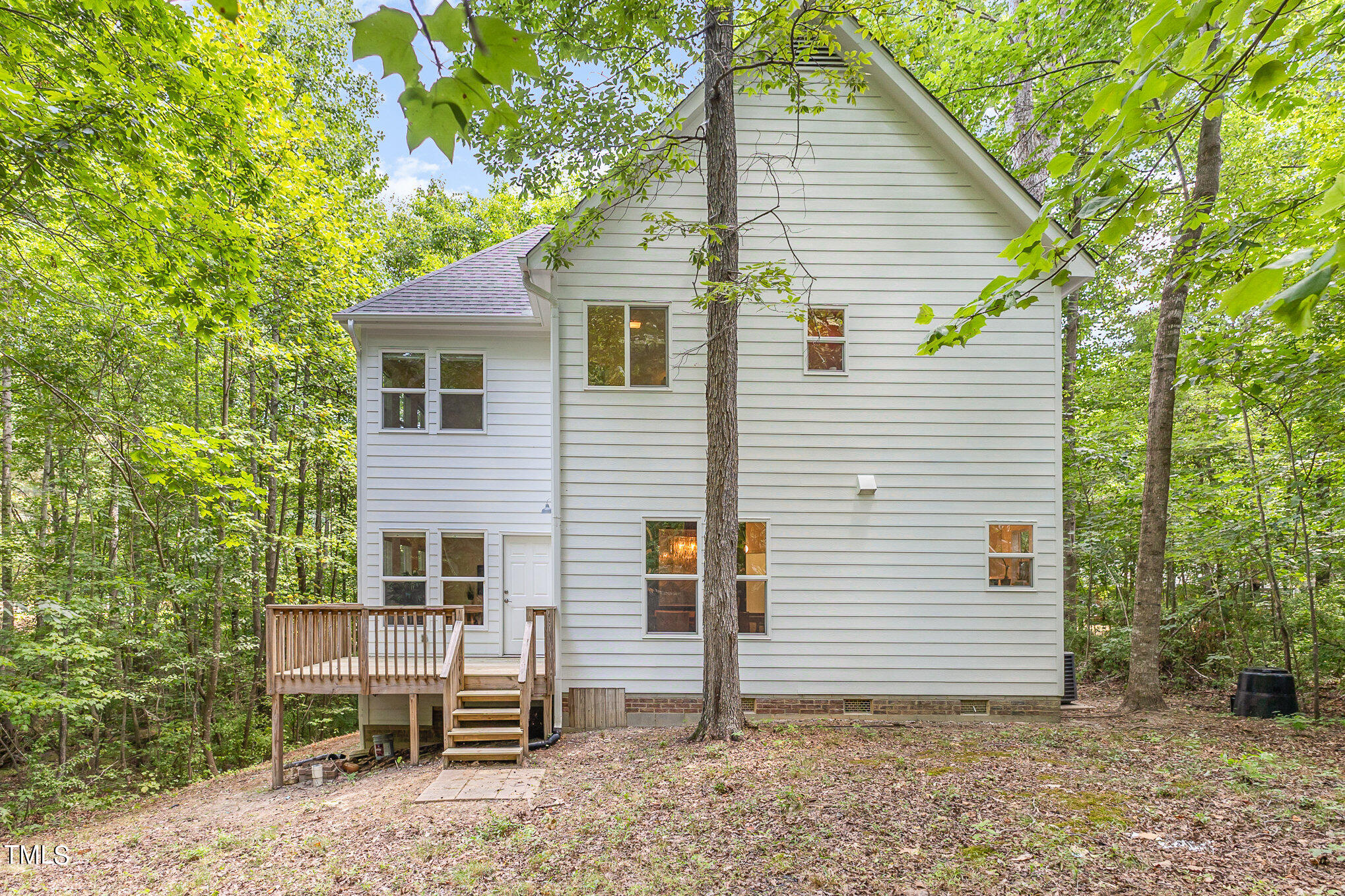 1713 Evergreen Avenue Raleigh, NC 27603 - Photo 25 of 26 a view of a house with a yard and sitting area