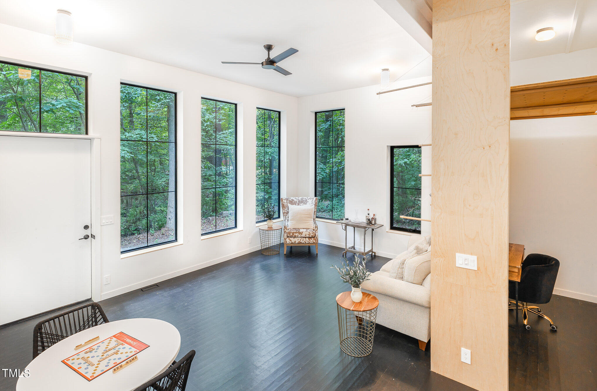 1713 Evergreen Avenue Raleigh, NC 27603 - Photo 3 of 26 a living room with furniture and a large window