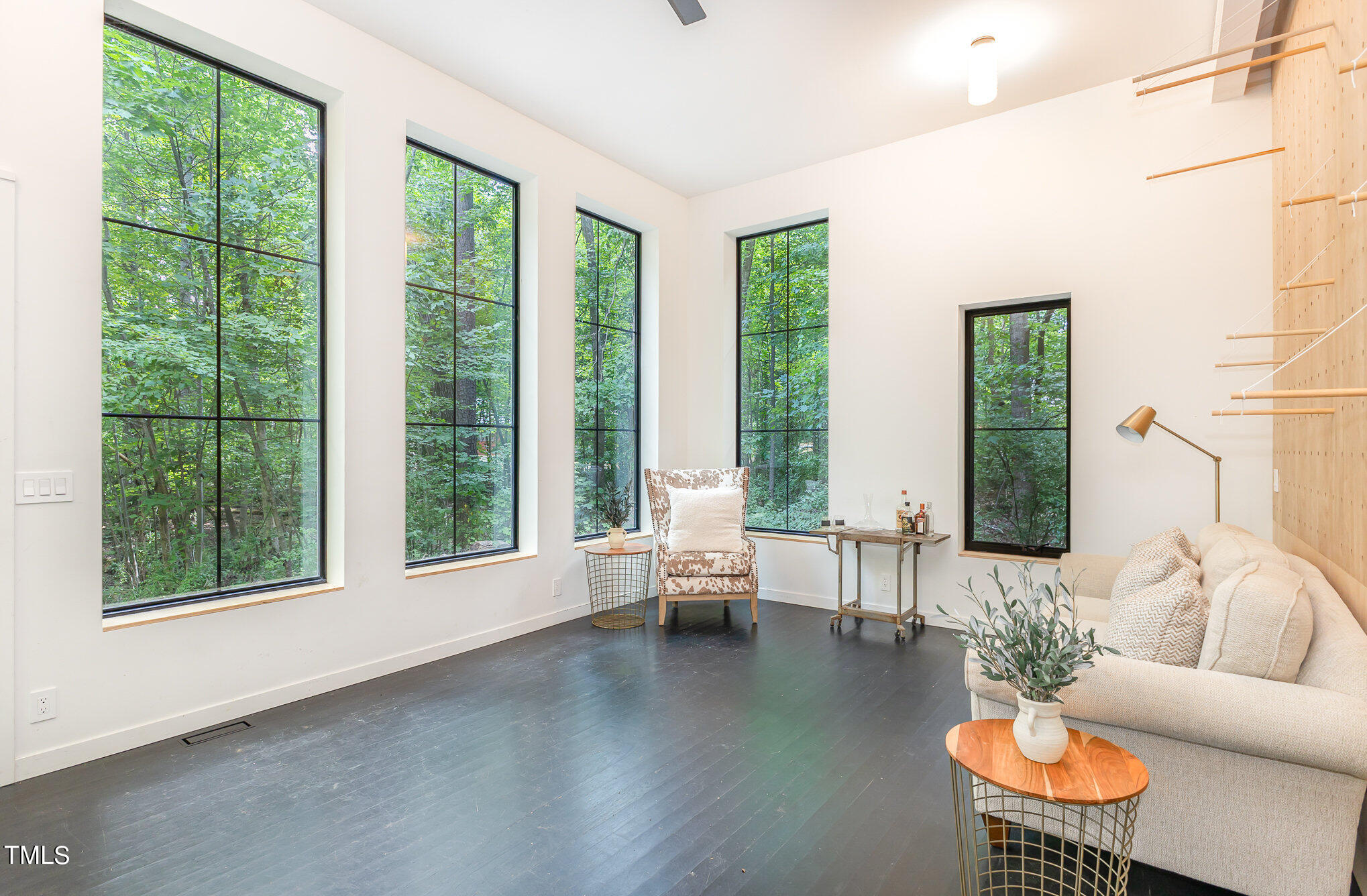 1713 Evergreen Avenue Raleigh, NC 27603 - Photo 4 of 26 a living room with furniture and a large window