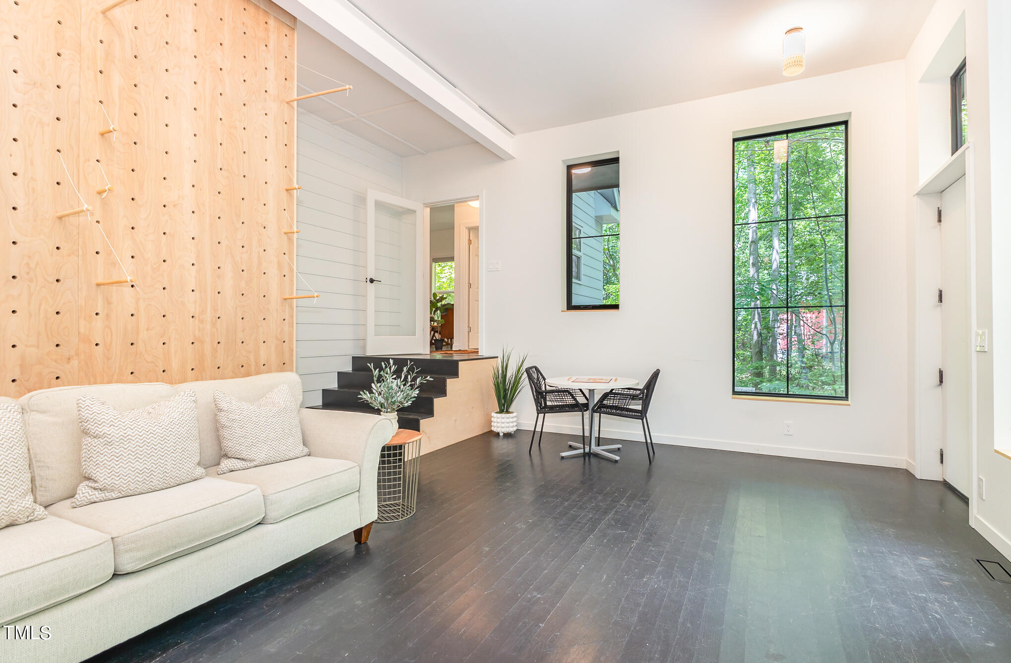 1713 Evergreen Avenue Raleigh, NC 27603 - Photo 5 of 26 a living room with furniture and wooden floor