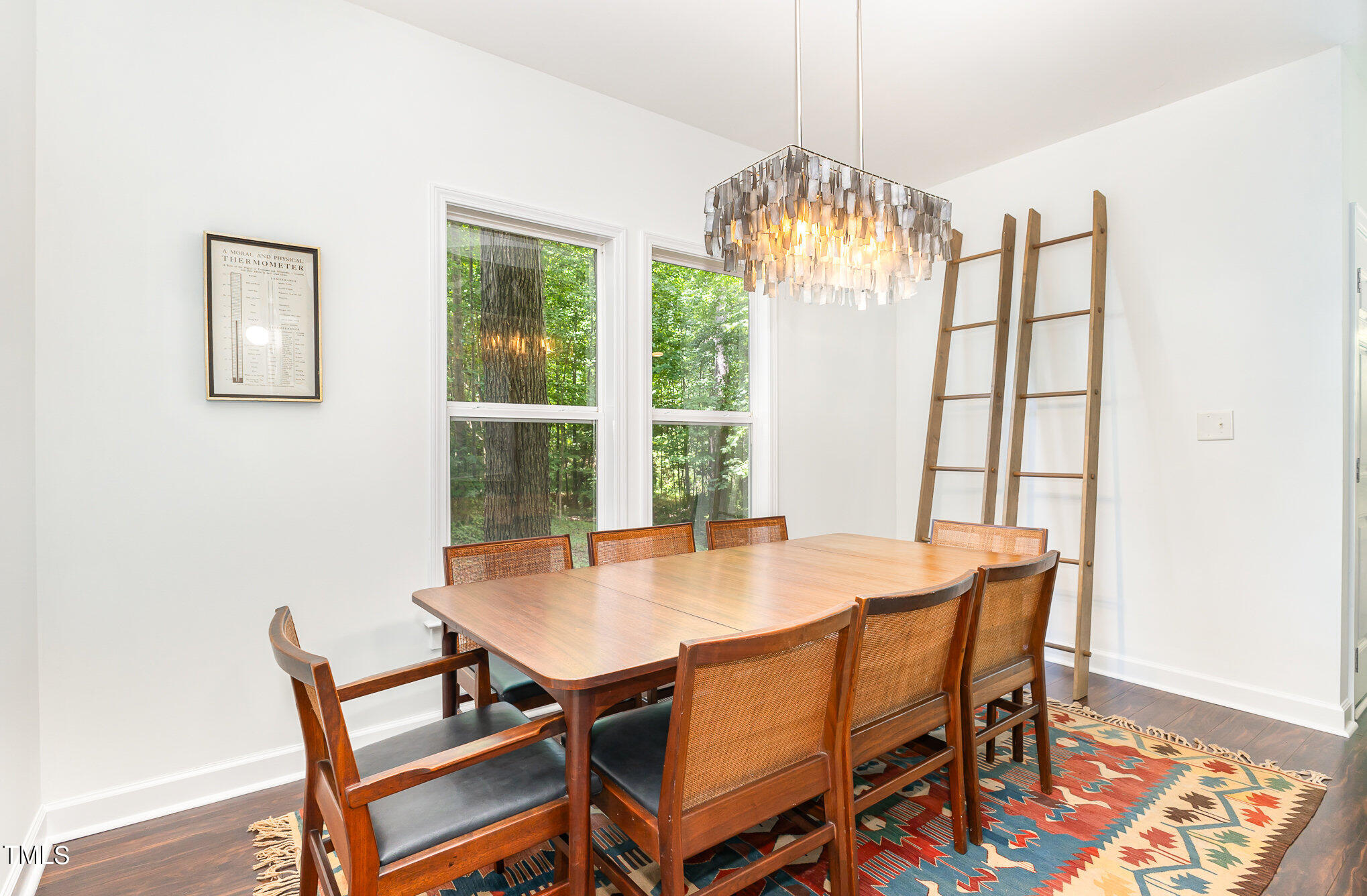 1713 Evergreen Avenue Raleigh, NC 27603 - Photo 9 of 26 a view of a dining room with furniture window and outside view