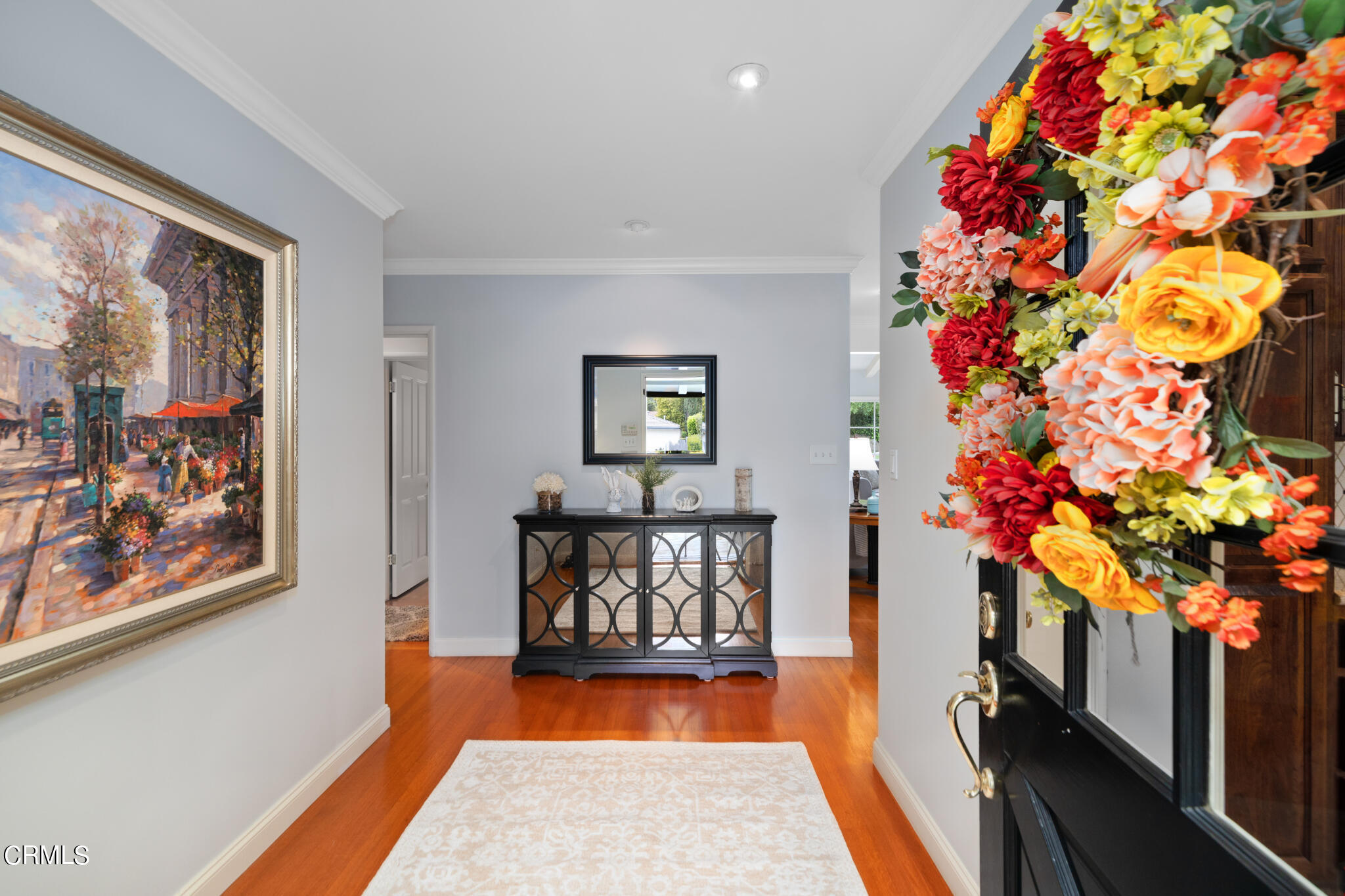 1825 Elevado Avenue Arcadia, CA 91006 - Photo 11 of 63 a living room with painting on the wall and a potted plant