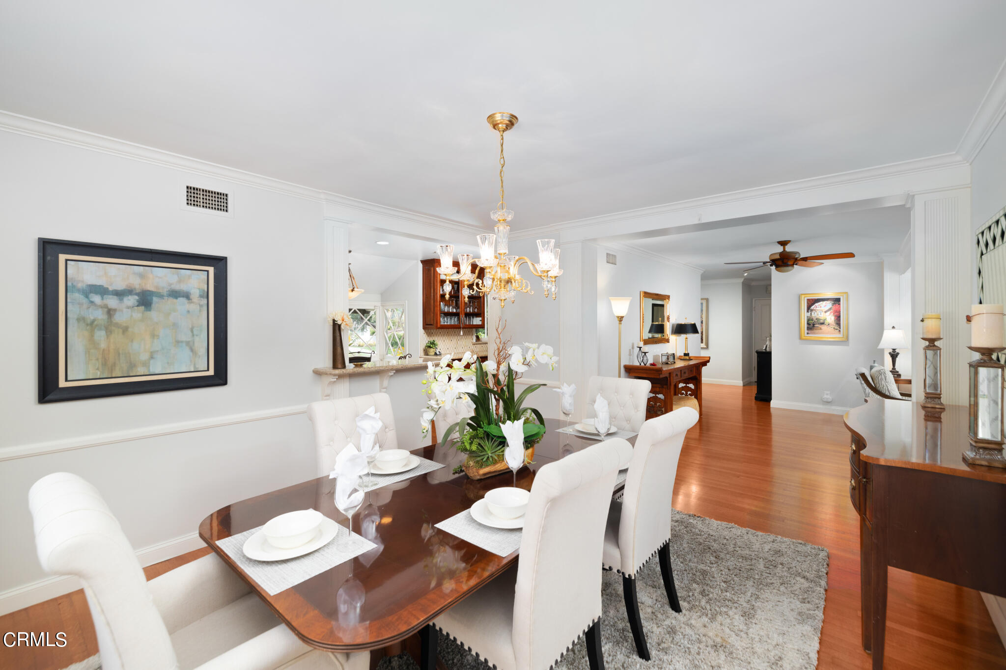 1825 Elevado Avenue Arcadia, CA 91006 - Photo 18 of 63 a dining room with furniture a rug and wooden floor