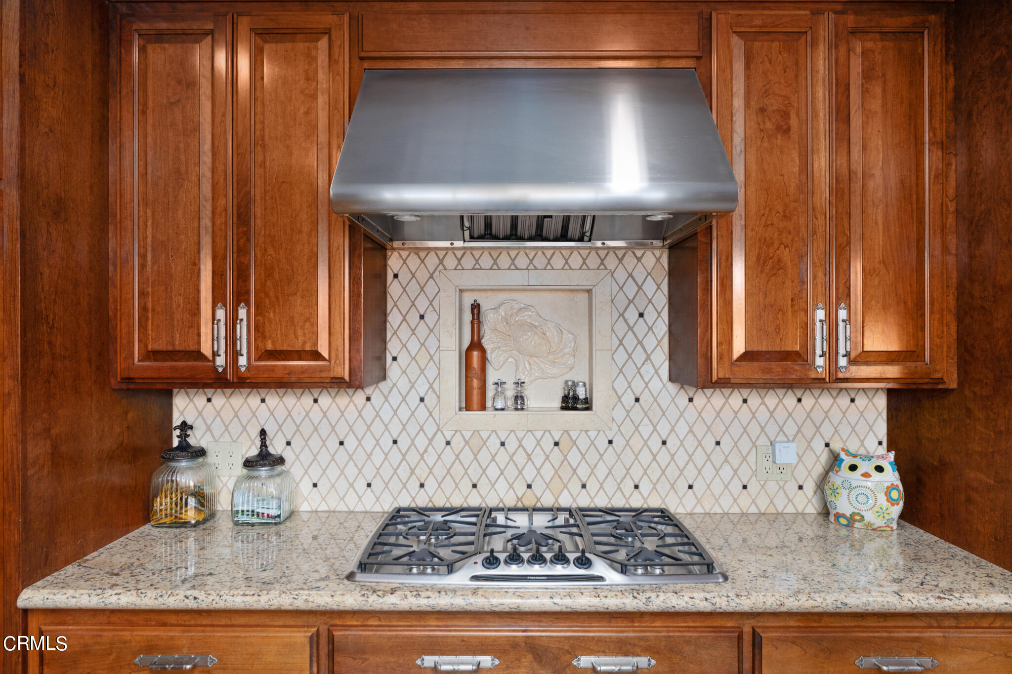 1825 Elevado Avenue Arcadia, CA 91006 - Photo 33 of 63 a kitchen with granite countertop stainless steel appliances wooden cabinets and a counter top