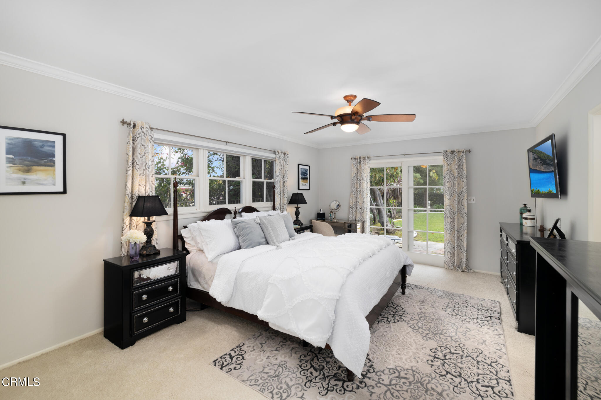 1825 Elevado Avenue Arcadia, CA 91006 - Photo 37 of 63 a large bedroom with a bed and a chandelier