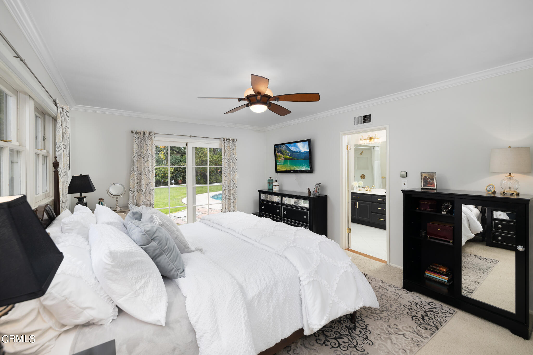 1825 Elevado Avenue Arcadia, CA 91006 - Photo 38 of 63 a large bedroom with a bed and wooden floor