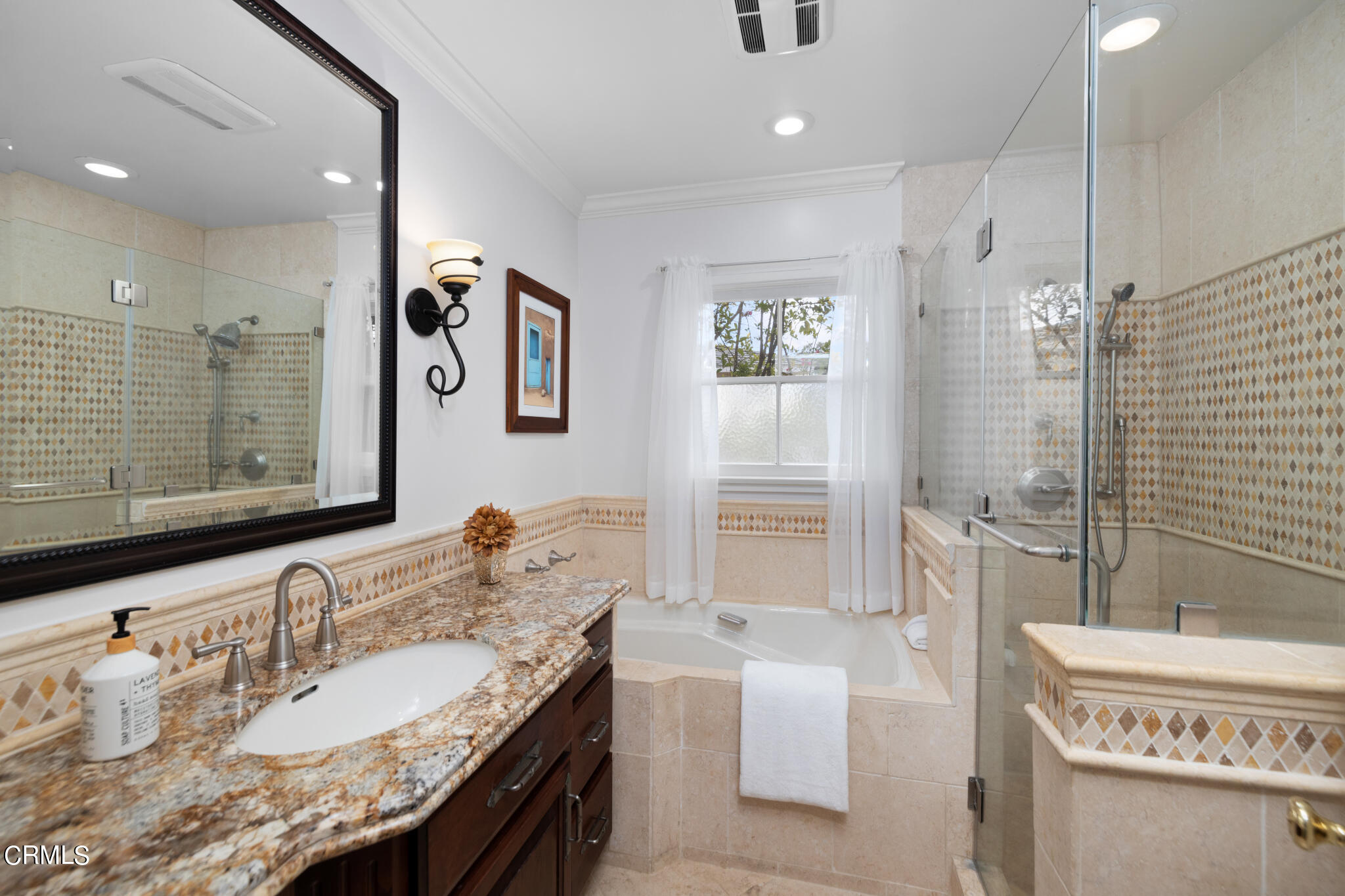 1825 Elevado Avenue Arcadia, CA 91006 - Photo 42 of 63 a spacious bathroom with a granite countertop double vanity sink a mirror and a bathtub