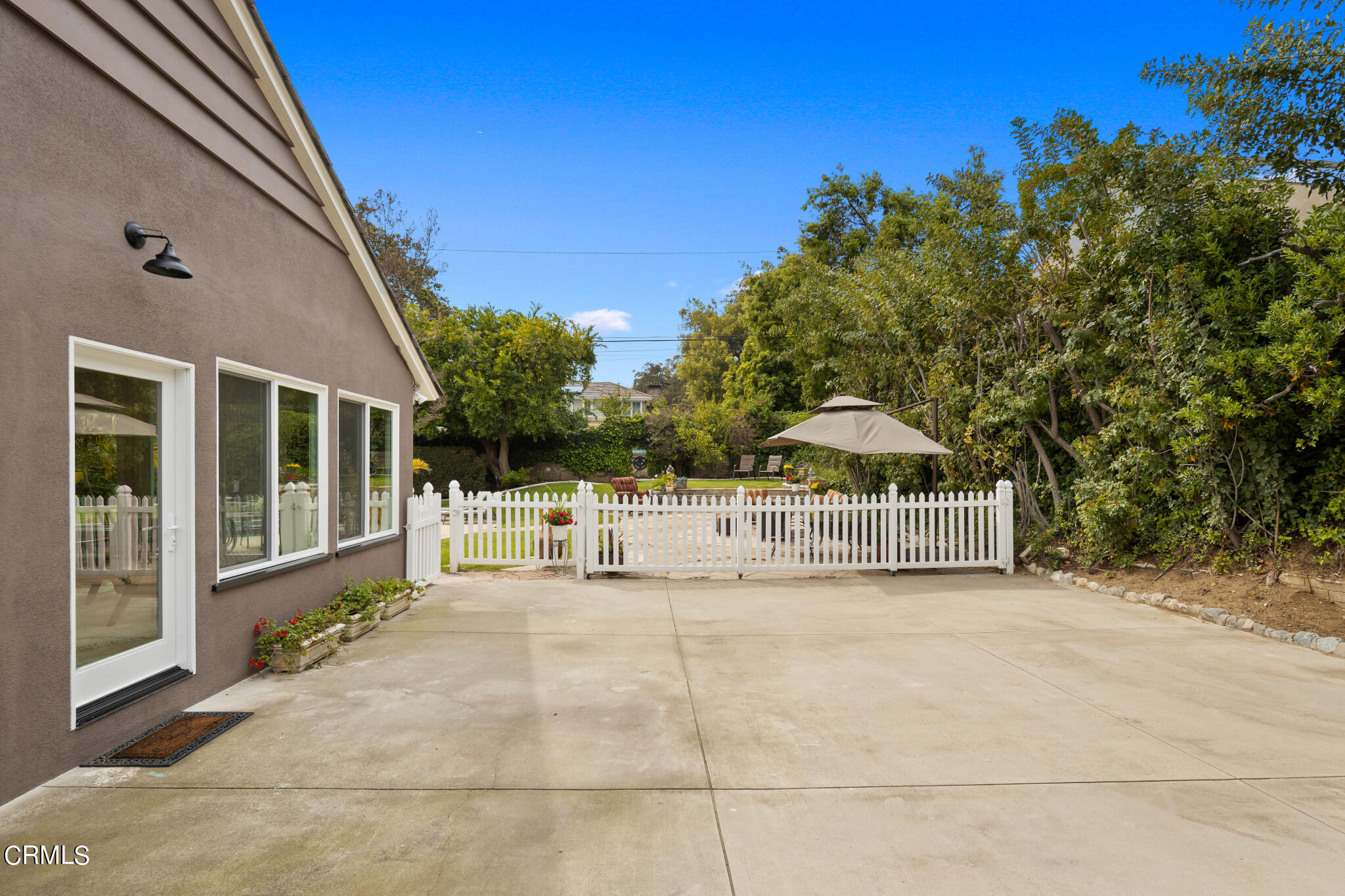 1825 Elevado Avenue Arcadia, CA 91006 - Photo 47 of 63 a view of a house with a big yard and potted plants