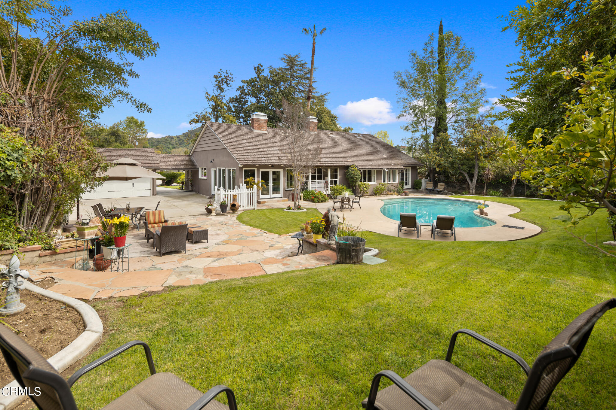 1825 Elevado Avenue Arcadia, CA 91006 - Photo 53 of 63 a view of a swimming pool with a patio