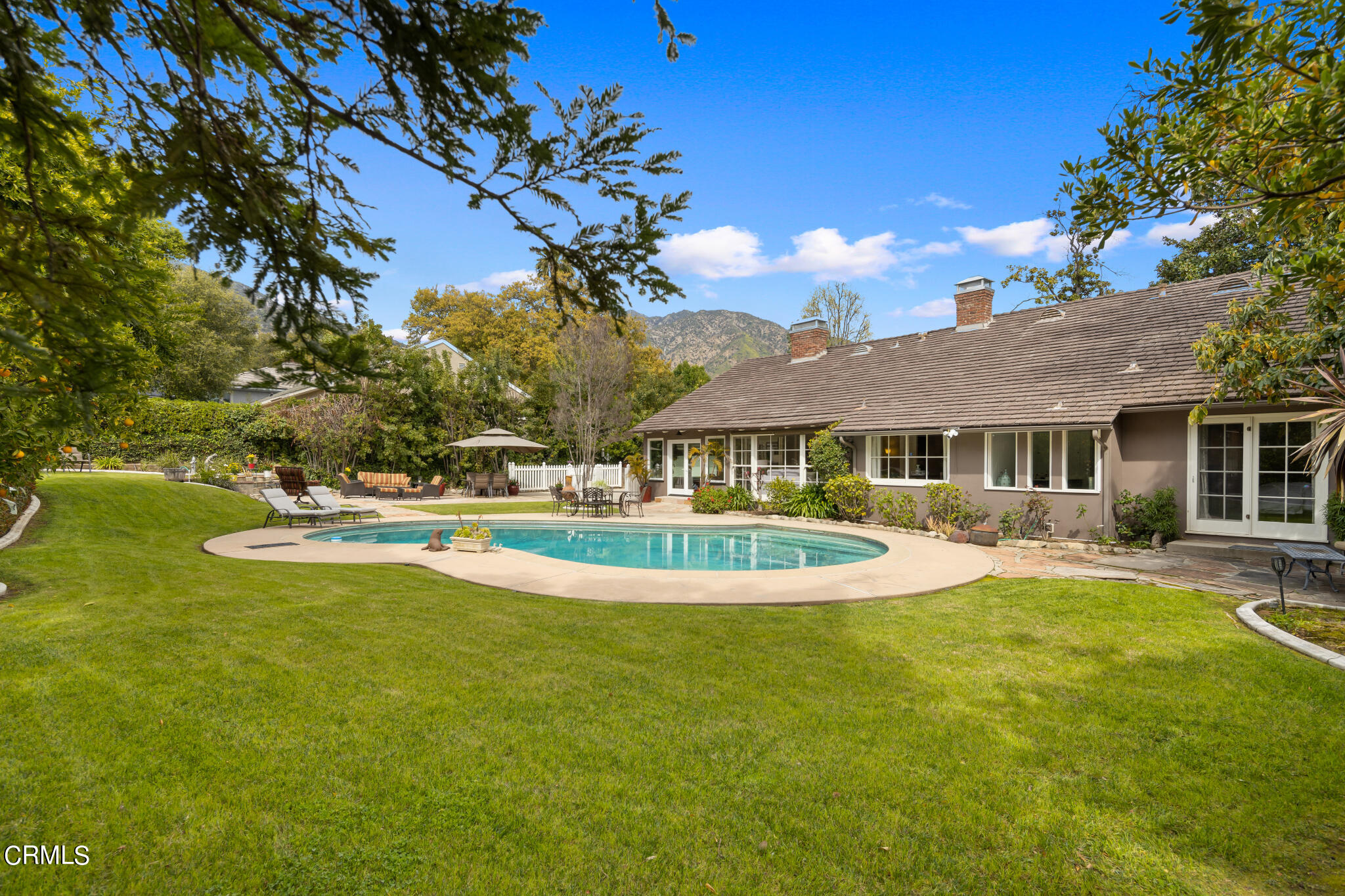 1825 Elevado Avenue Arcadia, CA 91006 - Photo 54 of 63 a view of a house with swimming pool and a yard