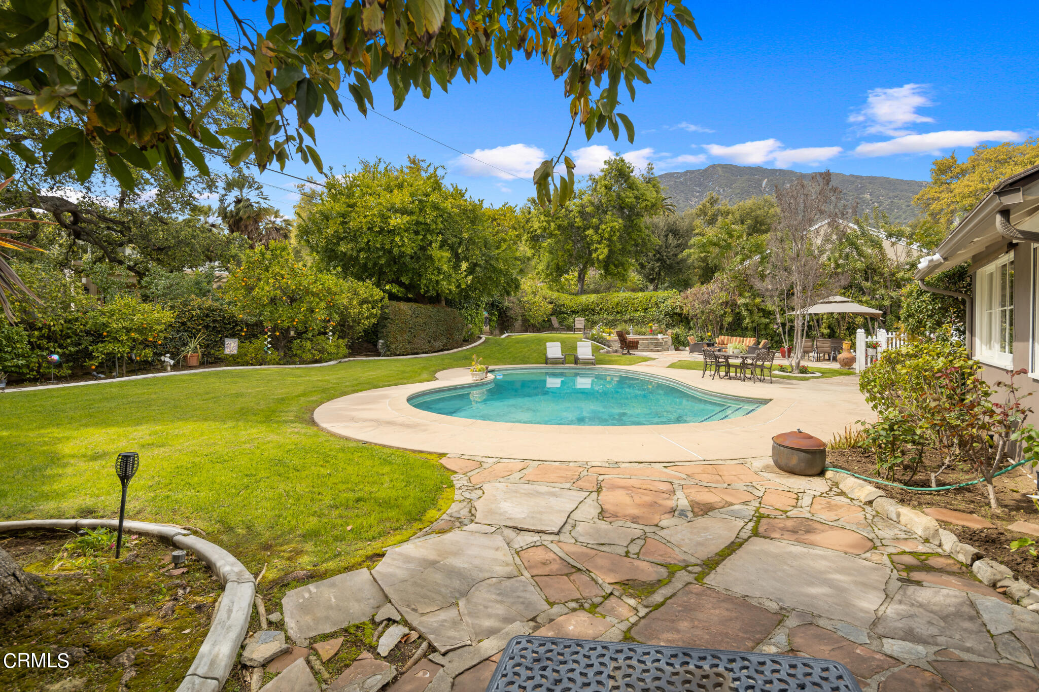 1825 Elevado Avenue Arcadia, CA 91006 - Photo 55 of 63 a view of a swimming pool with a yard