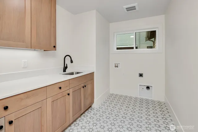 a bathroom with a sink a vanity and a mirror