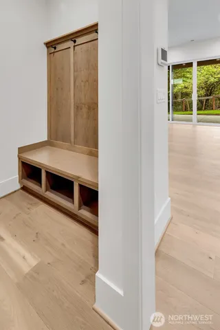 a view of livingroom with furniture window and front door