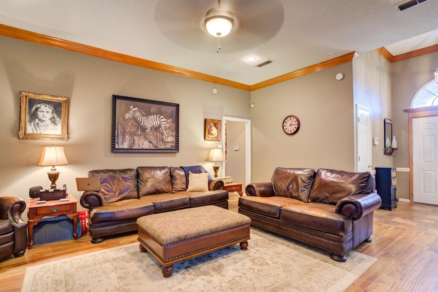 6022 78th Street Lubbock, TX 79424 - Photo 12 of 43 a living room with furniture and a couch