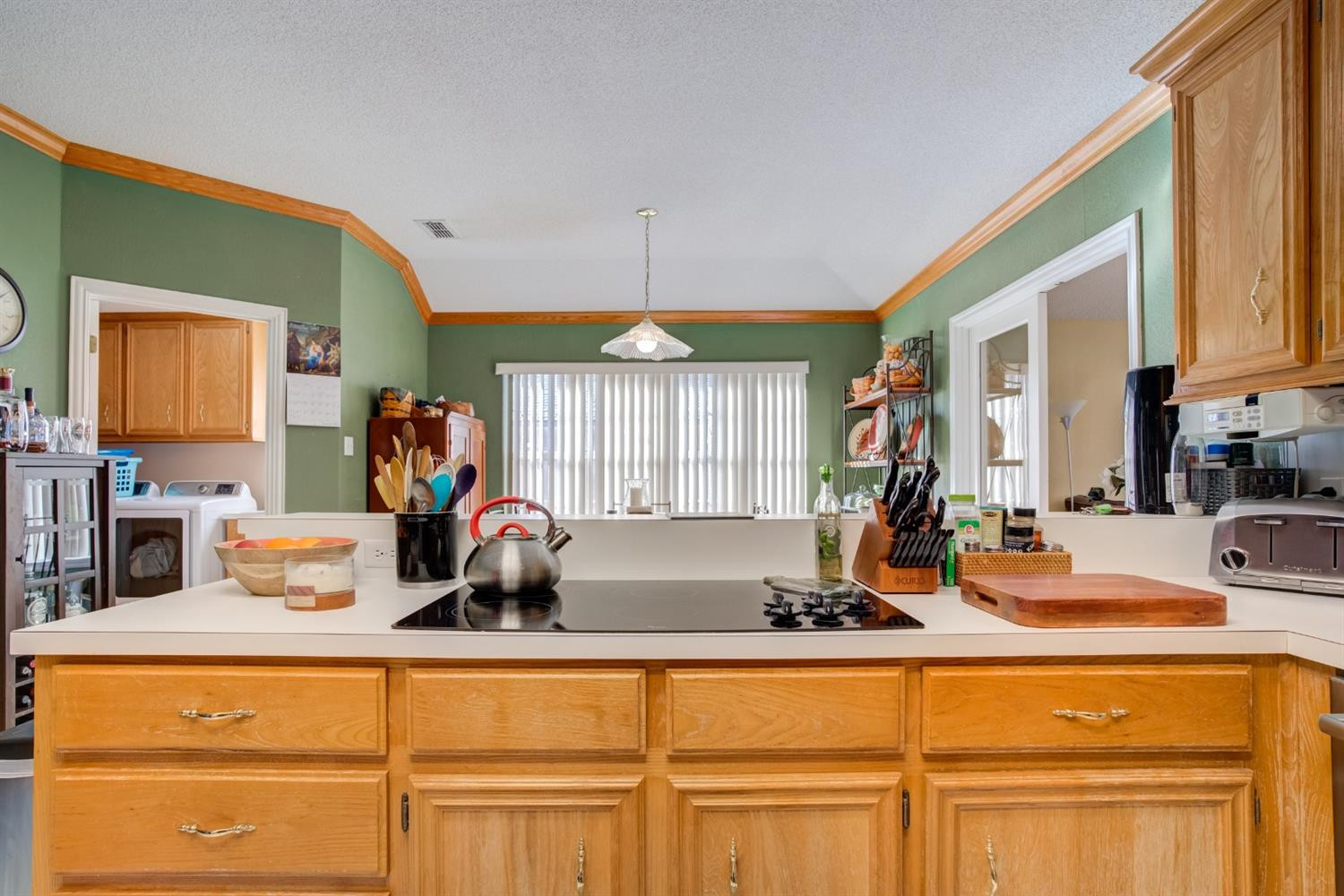 6022 78th Street Lubbock, TX 79424 - Photo 18 of 43 a kitchen with a sink and a wooden floor