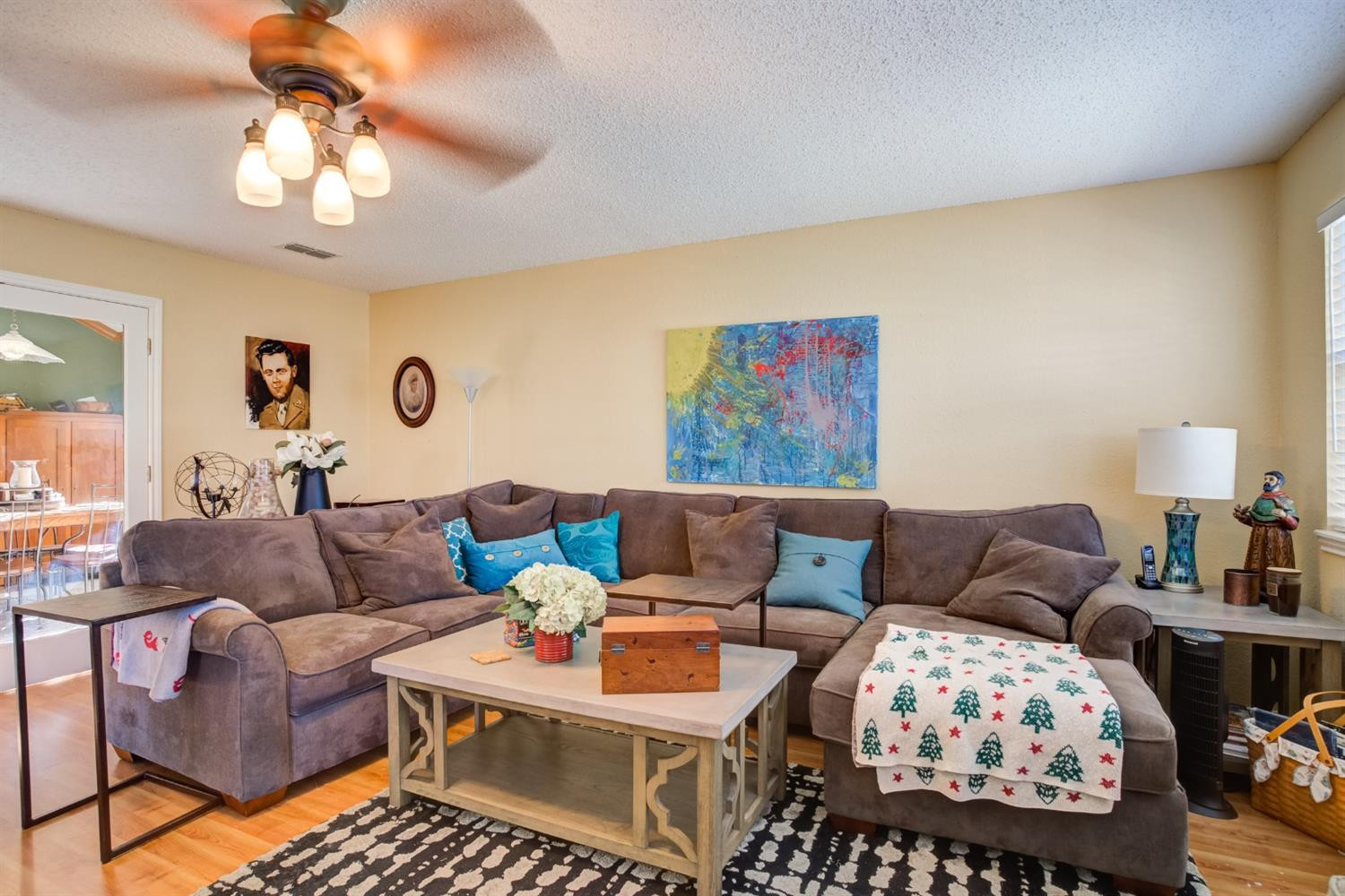 6022 78th Street Lubbock, TX 79424 - Photo 24 of 43 a living room with furniture and a lamp