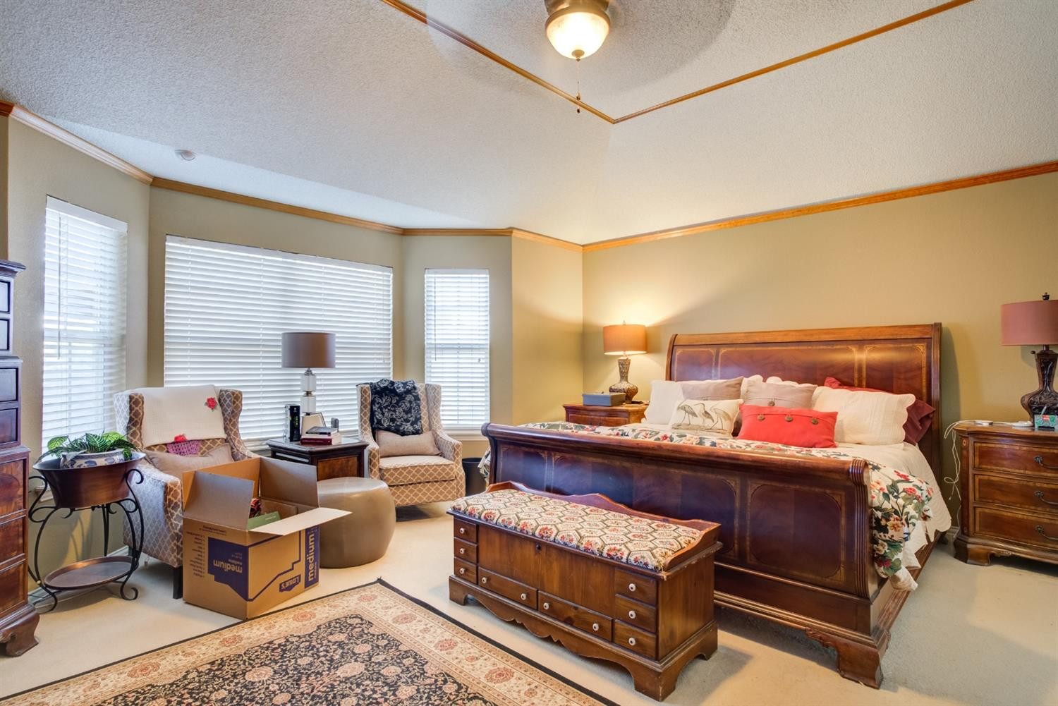 6022 78th Street Lubbock, TX 79424 - Photo 29 of 43 a bedroom with furniture and a large window