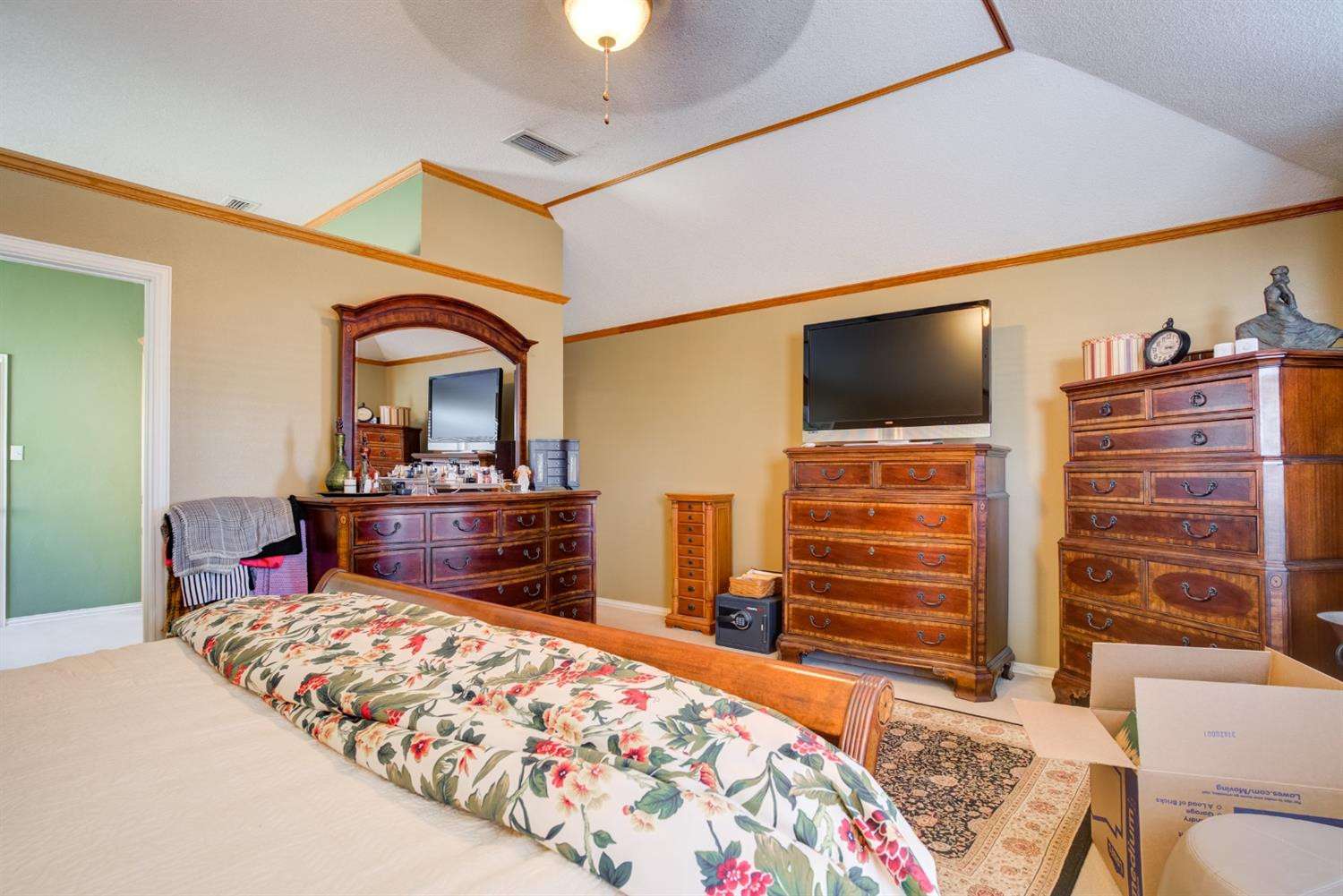 6022 78th Street Lubbock, TX 79424 - Photo 32 of 43 a bedroom with a bed and furniture