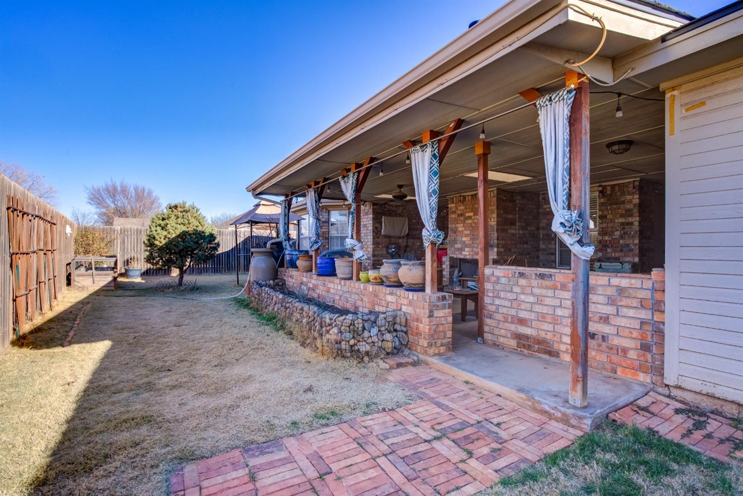6022 78th Street Lubbock, TX 79424 - Photo 41 of 43 a view of a house with a patio