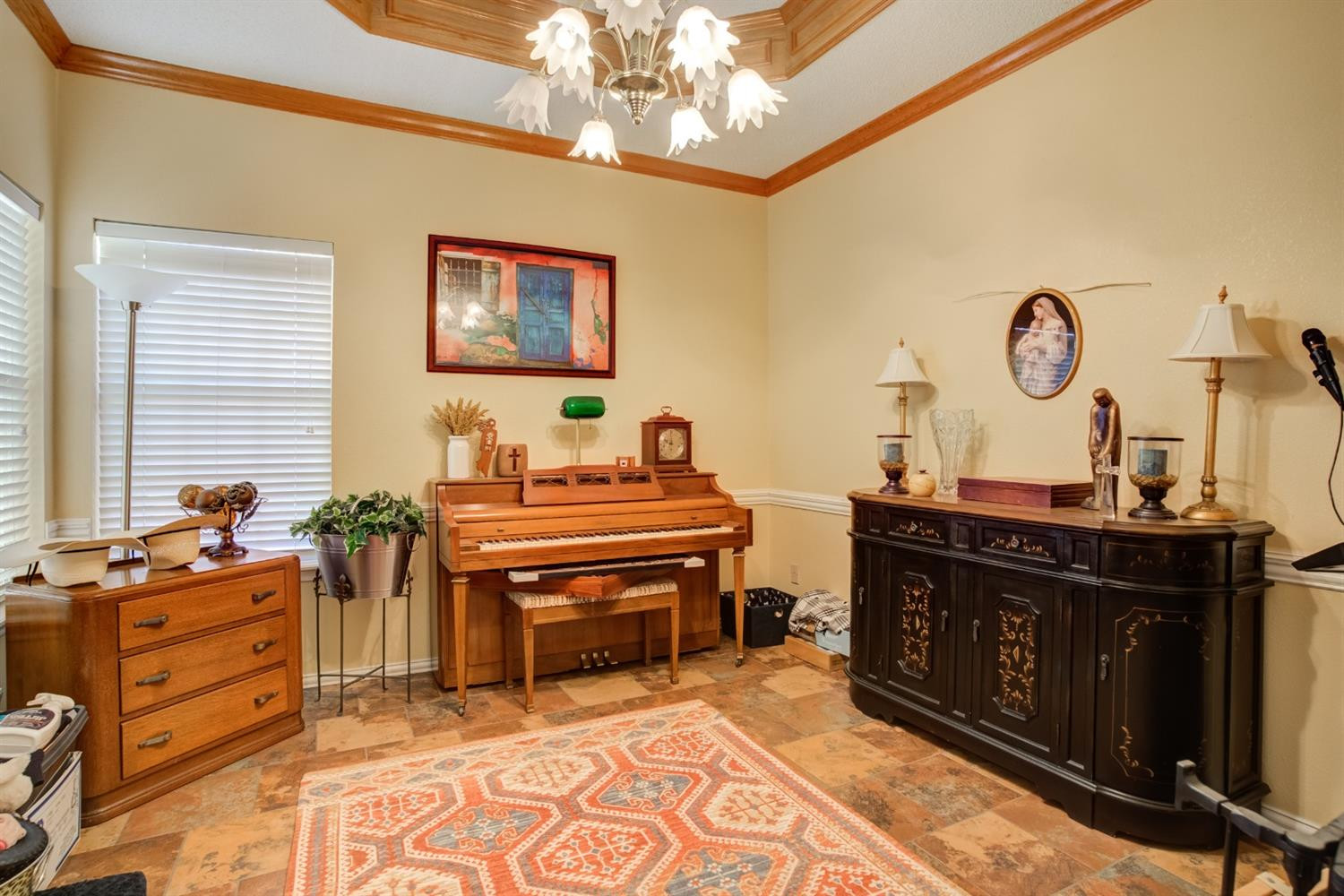6022 78th Street Lubbock, TX 79424 - Photo 7 of 43 a bed room with a bed and a fish tank