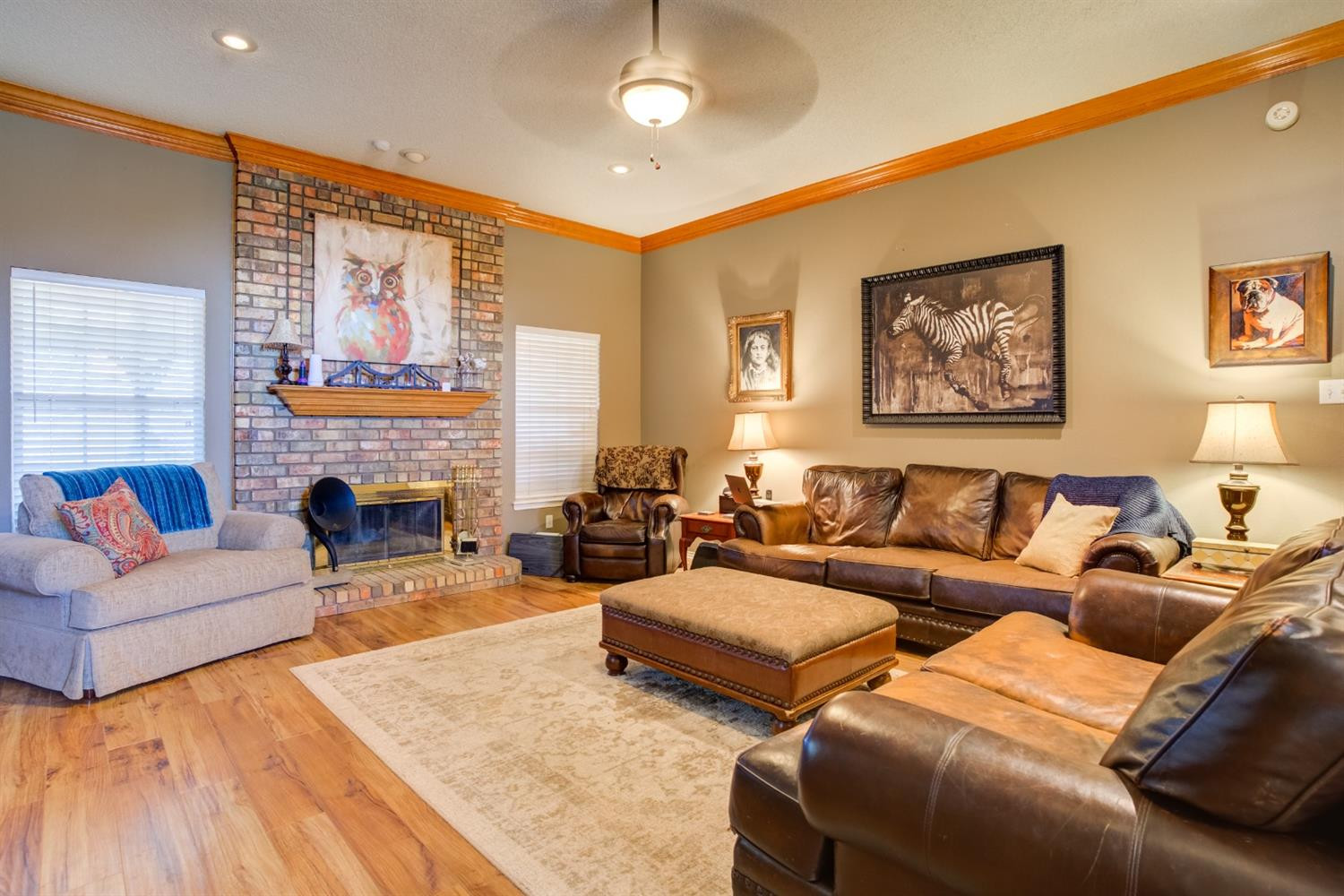 6022 78th Street Lubbock, TX 79424 - Photo 8 of 43 a living room with furniture fireplace and a fireplace