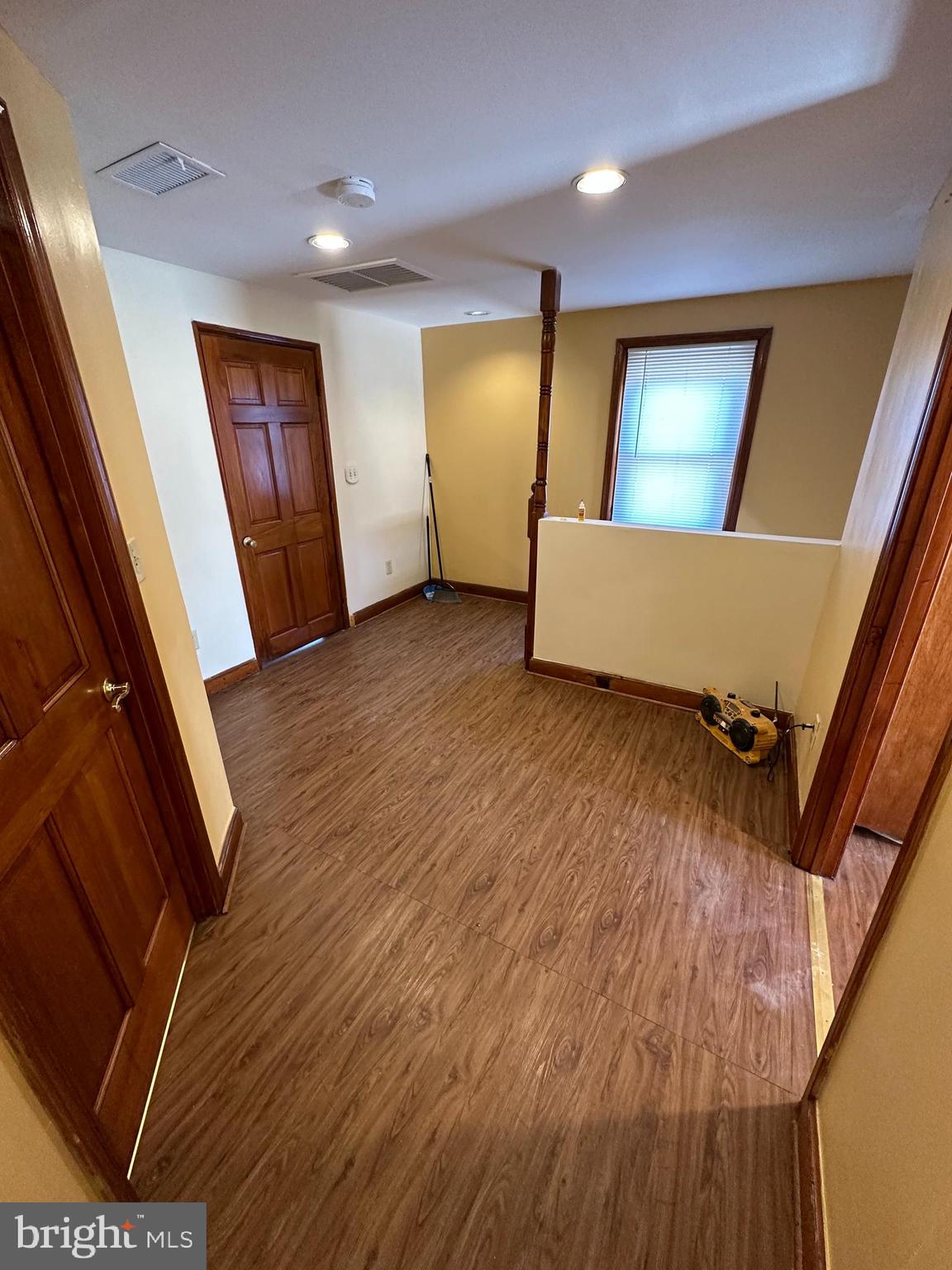 39 Yorke Street Salem, NJ 08079 - Photo 35 of 88 a view of a hallway with wooden floor and stairs