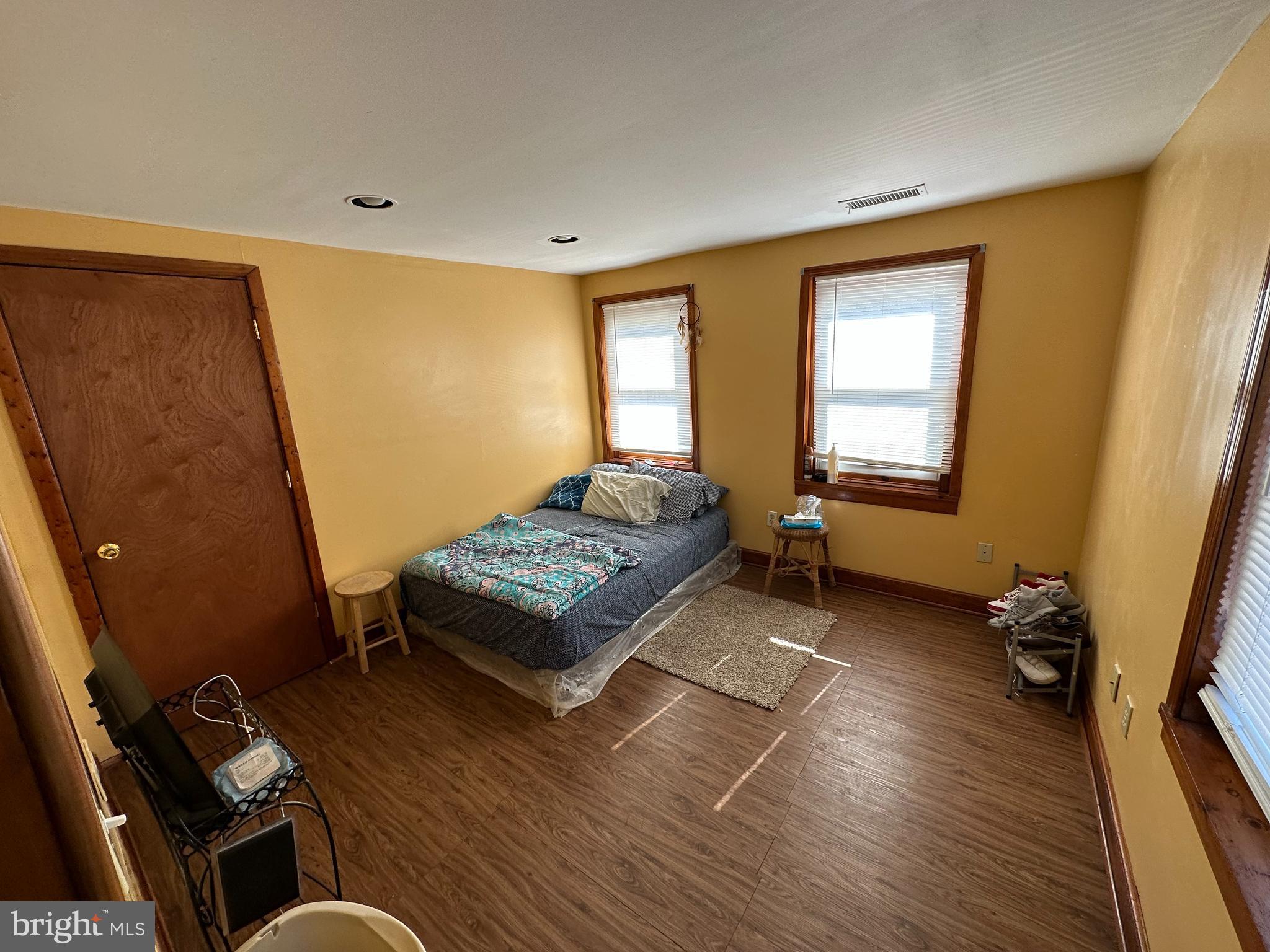39 Yorke Street Salem, NJ 08079 - Photo 45 of 88 a bedroom with a bed and wooden floor