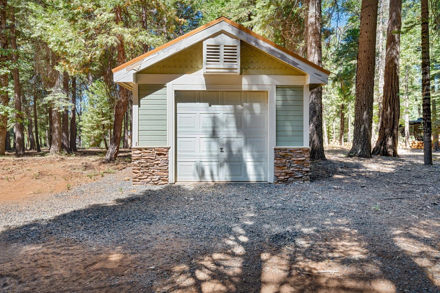 740 Hideaway Loop Alta, CA 95701 - Photo 54 of 74 a front view of a house with a yard