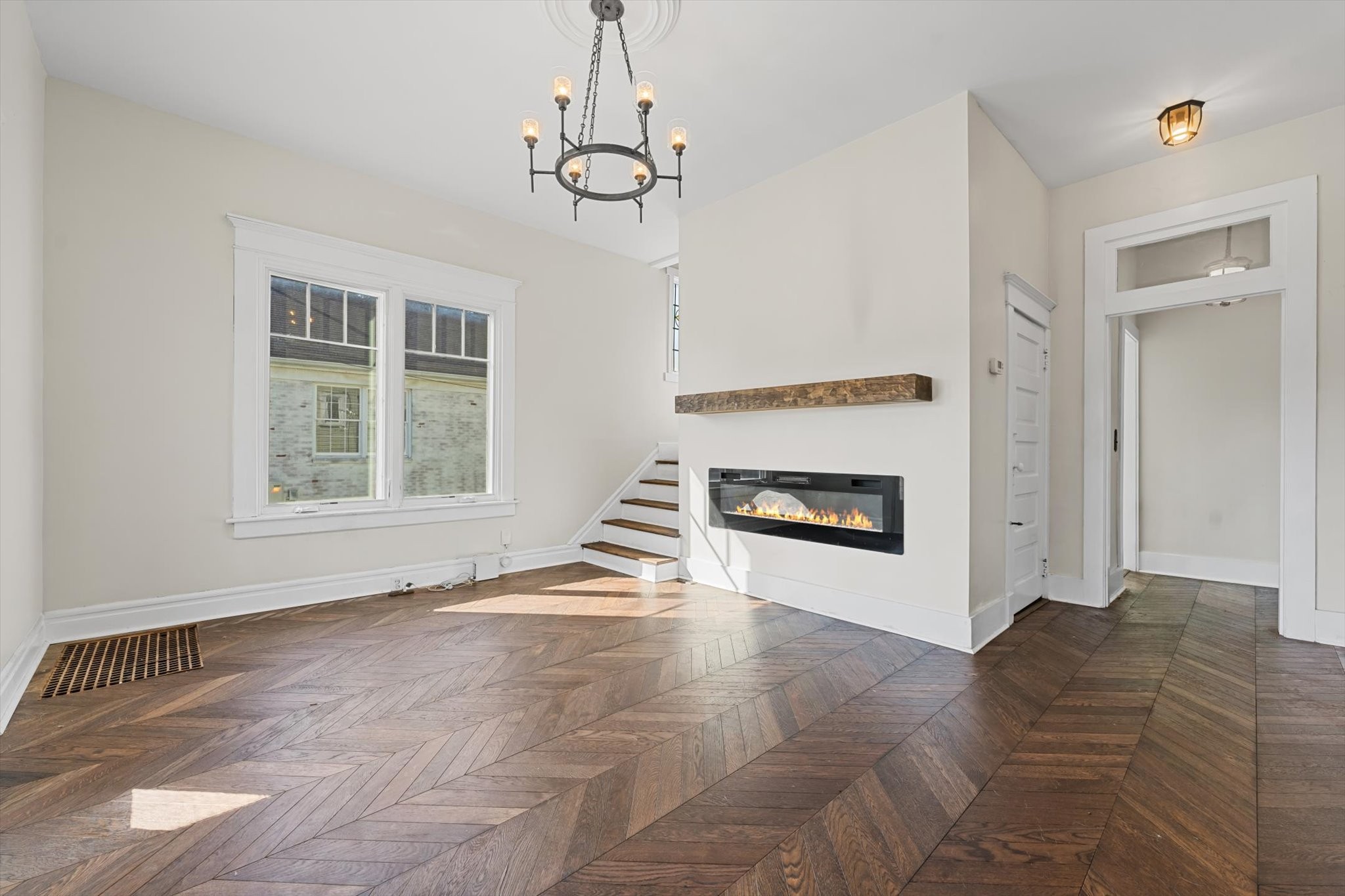 409 North Oak Street Springfield, TN 37172 - Photo 2 of 32 a view of an empty room with a window and fireplace
