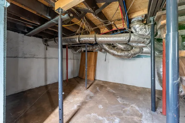 a view of a room with wooden walls