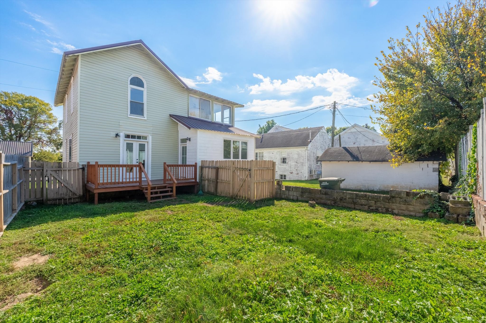 409 North Oak Street Springfield, TN 37172 - Photo 29 of 32 a view of a house with a yard and deck