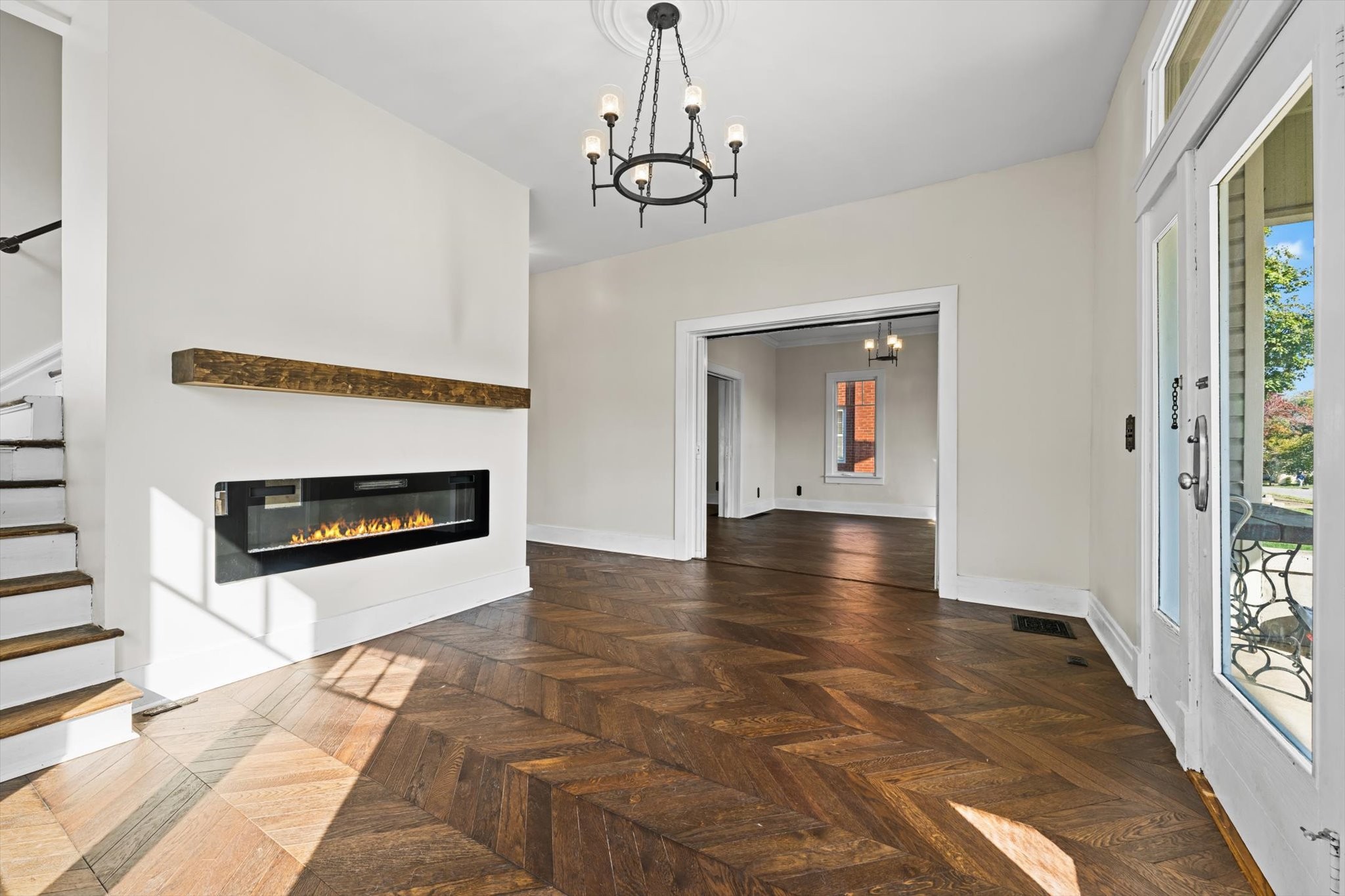 409 North Oak Street Springfield, TN 37172 - Photo 7 of 32 a view of a livingroom with wooden floor a fireplace and window