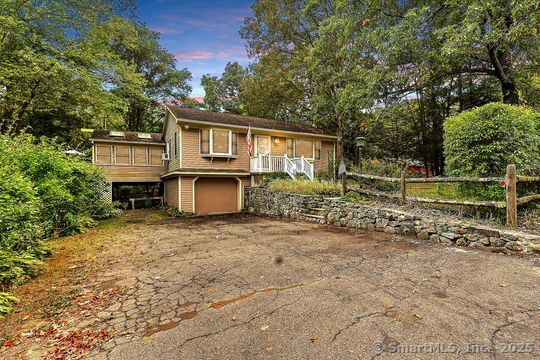 161 Jockey Hollow Road Monroe, CT 06468 - Photo 1 of 37 a front view of a house with a yard