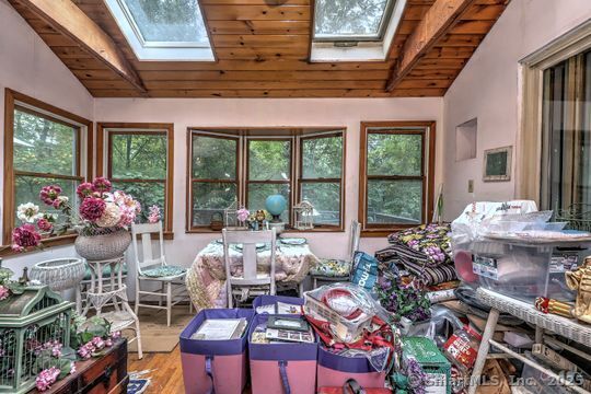161 Jockey Hollow Road Monroe, CT 06468 - Photo 24 of 37 a room with lots of furniture and a potted plant