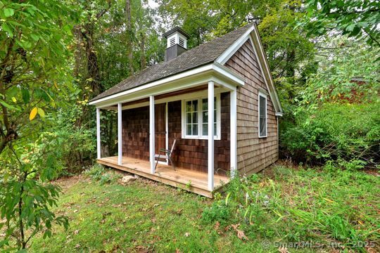 161 Jockey Hollow Road Monroe, CT 06468 - Photo 7 of 37 a view of house with backyard and glass windows
