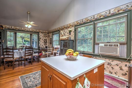 161 Jockey Hollow Road Monroe, CT 06468 - Photo 10 of 37 a view of a dining room with furniture window and outside view