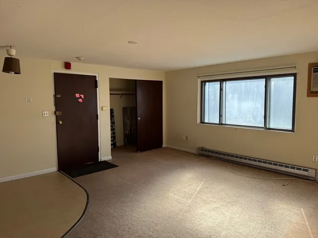 an empty room with windows